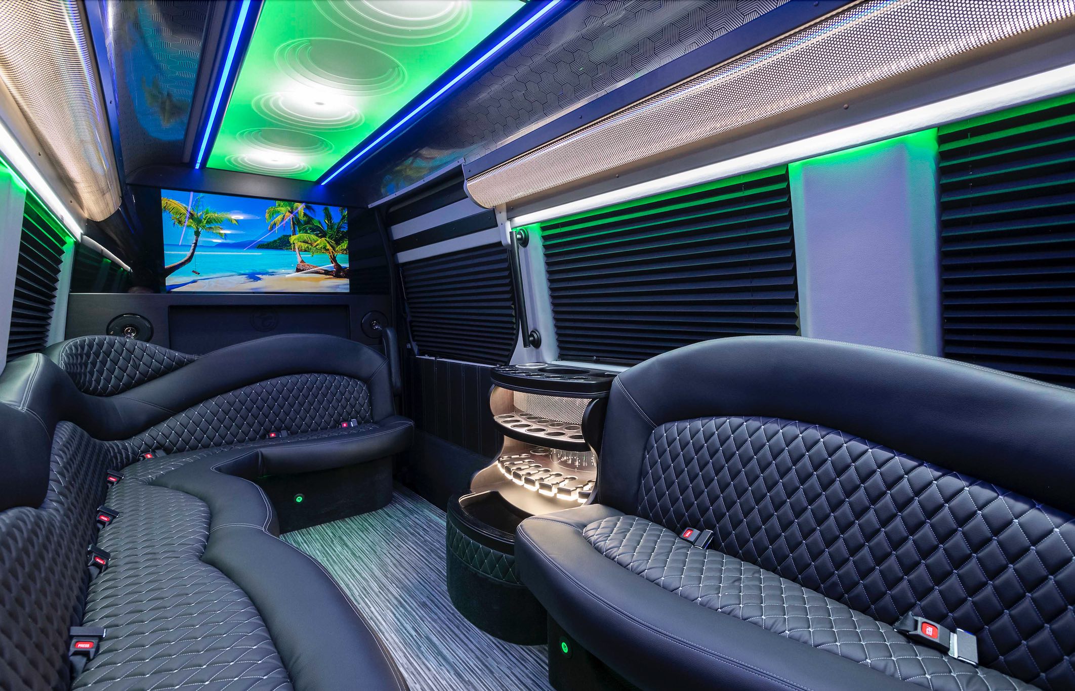 Book a luxurious 13-passenger Mercedes-Benz Sprinter van for your next special event or celebration, featuring mood lighting, luxury limo-style seating, a Bluetooth speaker system, and a minibar. Perfect for special events, wedding transfers, VIP Transportation, etc.